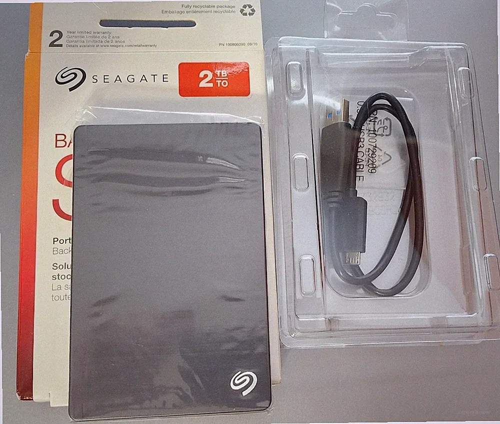 BACKUP PLUS SLIM SEAGATE 2TB EXTERNAL HARD DISK DRIVE USED