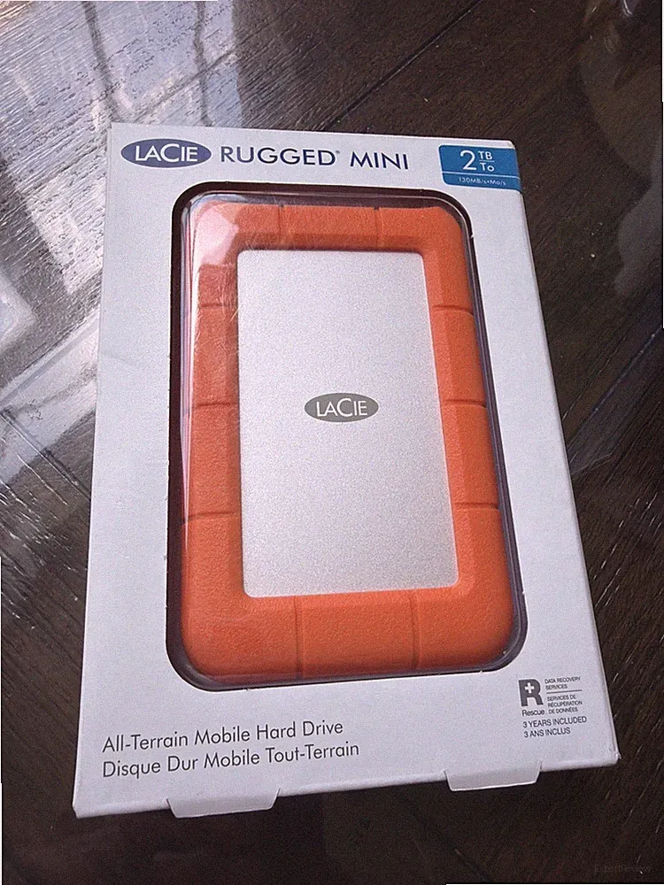 NEW SEALED LaCie LAC9000298 Rugged Mini 2TB External Hard Drive - Orange